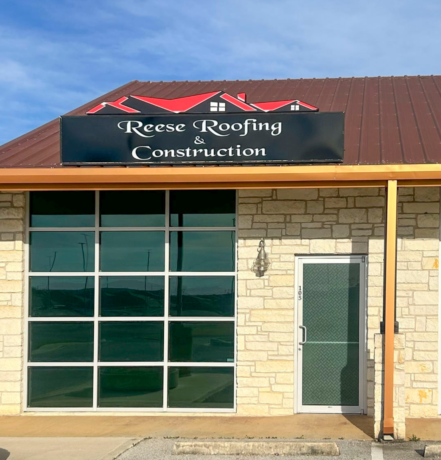 top down picture of roofer working on commercial roof 